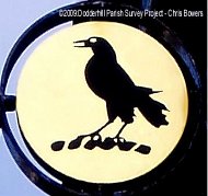 The Raven is seen on buildings associated with John Corbett